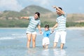 Happy family summer sea beach vacation. Asia youngÃÂ people lifestyle travel enjoy fun and relax leisure destination in holiday. Royalty Free Stock Photo